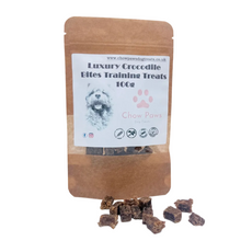 Load image into Gallery viewer, Package of Luxury Crocodile Bites Training Treats by Chow Paws with treats displayed in front.
