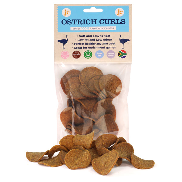 Package of Ostrich Curls dog treats with visible treats on a white background