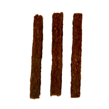 Load image into Gallery viewer, Three brown dog treats on a white background
