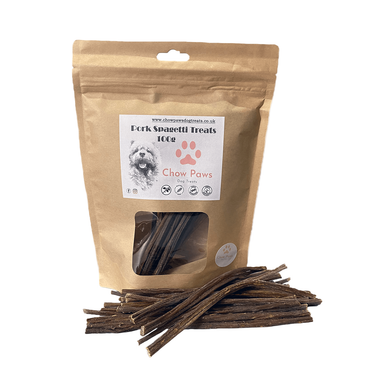 Pouch of pork snagglets treats with visible treats on a white background