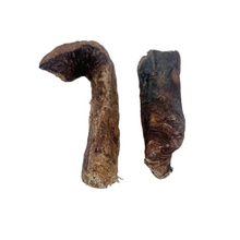 Load image into Gallery viewer, Two brown, curved sticks on a light gray background
