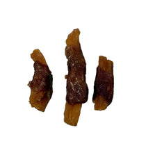 Load image into Gallery viewer, Three brown pieces of Sweet Potato Wrapped in Duck on a light Gray surface
