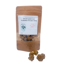 Load image into Gallery viewer, Brown package of trout and cod training treats with a label on a white background
