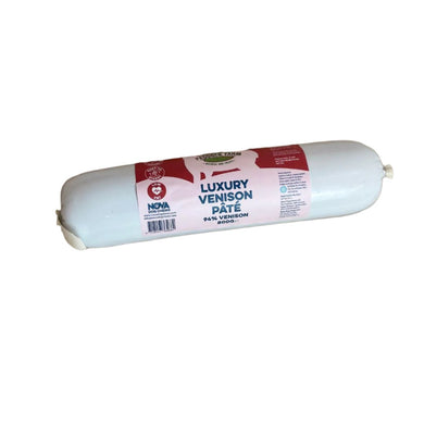 A rolled-up packaging of Nova Luxury Venison Pate in a white tube with red and green text, displaying the product name and details.