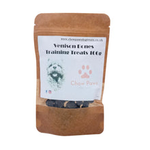 Load image into Gallery viewer, A stand-up kraft paper pouch of Chew Paws Venison Bones Training Treats 100g, containing dark brown treats visible through a clear window at the bottom, set against a plain white background.
