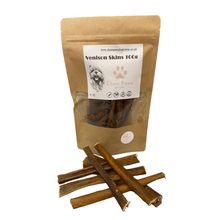 Load image into Gallery viewer, Kraft paper packaging of Venison Skins with dog treats in front on a white background
