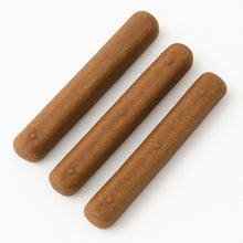 Load image into Gallery viewer, Three brown dog treats on a white background
