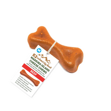 Load image into Gallery viewer, Dog chew treat shaped like a bone with a label on a white background
