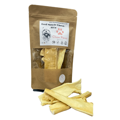 Package of beef muscle chews for dogs with visible chews on a white background