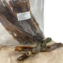 Load image into Gallery viewer, Dried camel braids in a clear plastic bag on a wooden surface
