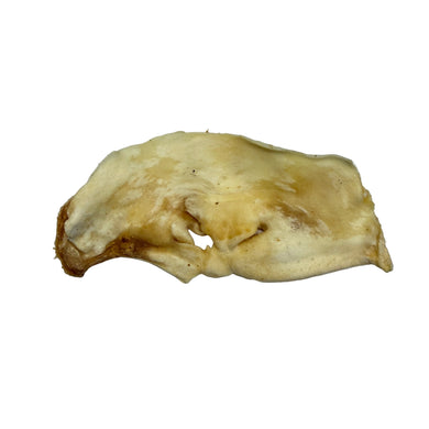 Raw dried lamb snout on a white background