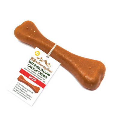 Dog chew treat shaped like a bone with a label on a white background