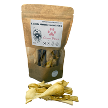 Load image into Gallery viewer, Bag of &#39;Chow Paws&#39; lamb muscle meat treats with some treats displayed in front on a white background.
