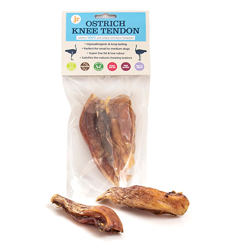 Packaged ostrich knee tendon for dogs displayed in a clear plastic bag with a blue and white label, and two pieces of the dried tendon shown outside the package.