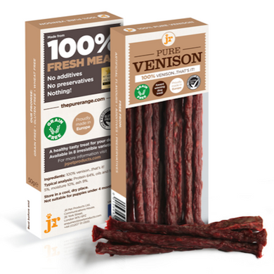 Packaging of JR Pure Venison Sticks showing the product and its name, along with the statement '100% Fresh Venison' and 'No additives, No preservatives'. The physical product is a pack of air-dried, grain-free venison treats for dogs.